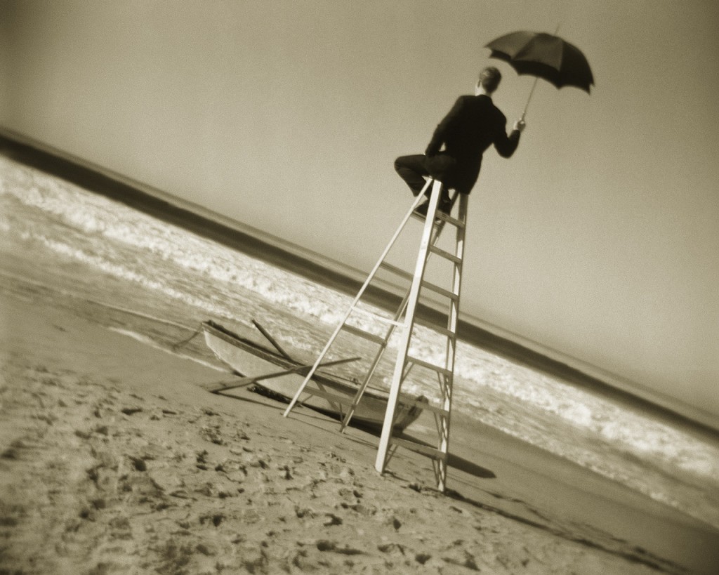 Businessman Sitting on Ladder with Umbrella